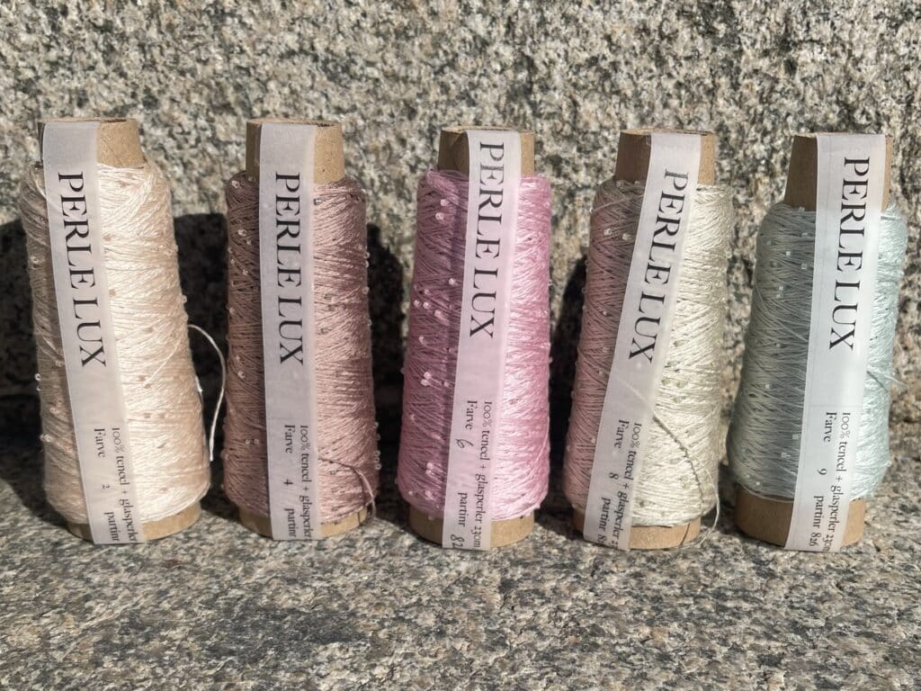 Perle Lux. Tencel garn med små glasperler